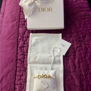 DioRevolution Gold-Tone Logo with white Pearls Bracelet